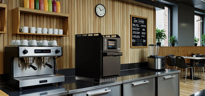 Lainox Oracle XS high speed oven, Black, installed on a coffee shop counter