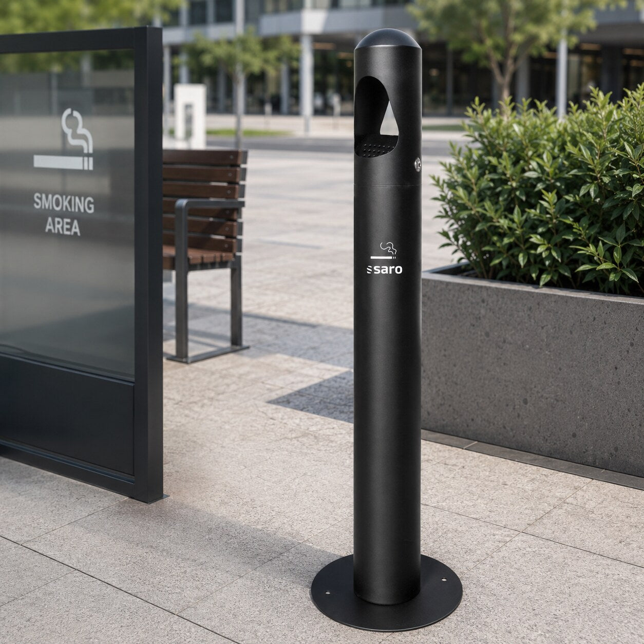 Saro RANA floor ashtray, beside a smoking area sign