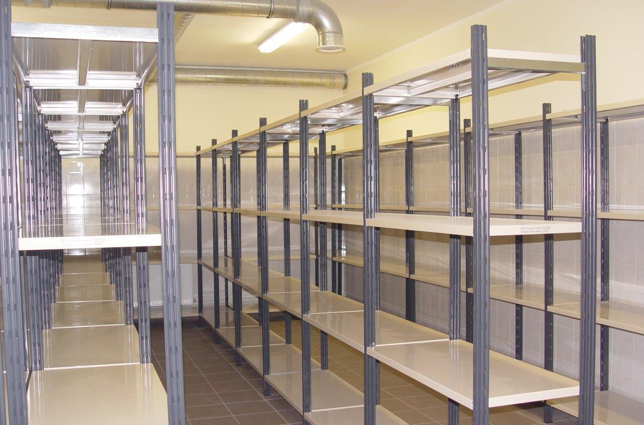 A long run of LaFortezza Universal shelving bays in a warehouse aisle