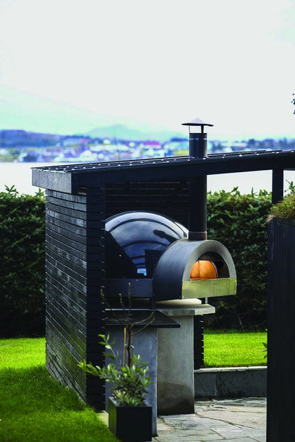 Pavesi Forni JOY 90 wood-fired pizza oven installed outdoors