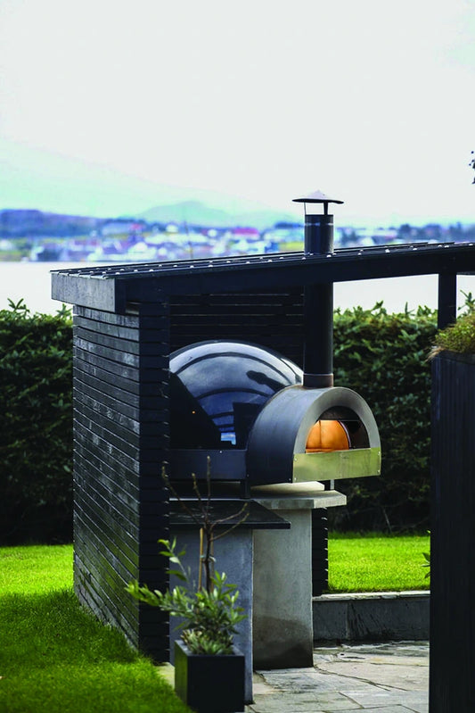 Pavesi Forni JOY 90 wood-fired pizza oven installed outdoors