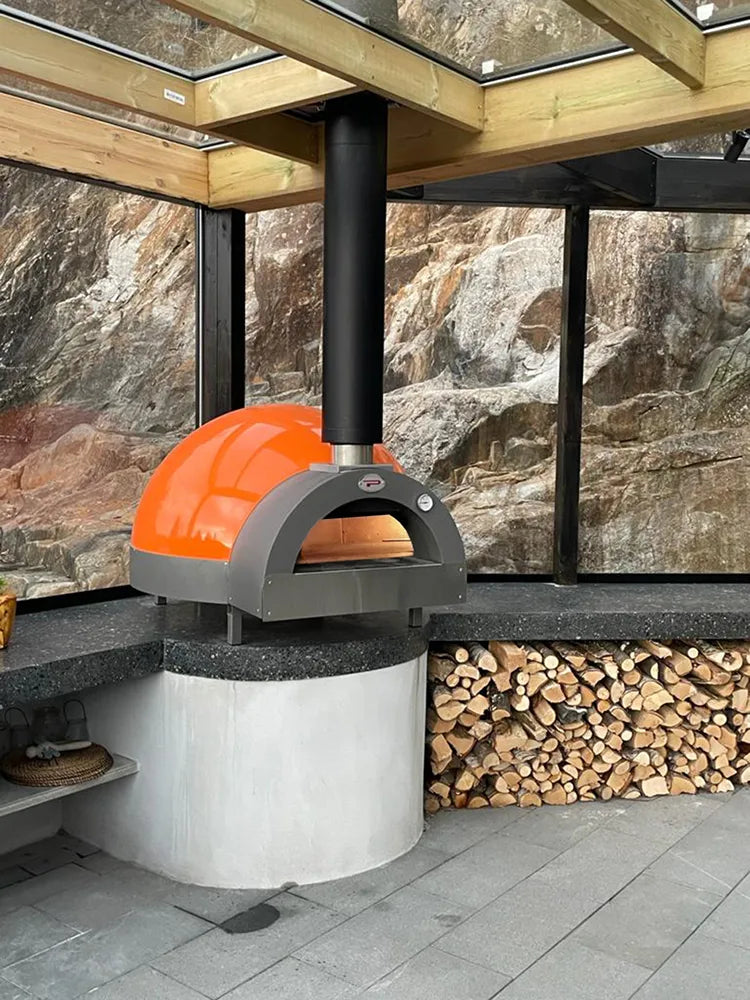 Pavesi Forni JOY 90 wood-fired pizza oven in a restaurant setting
