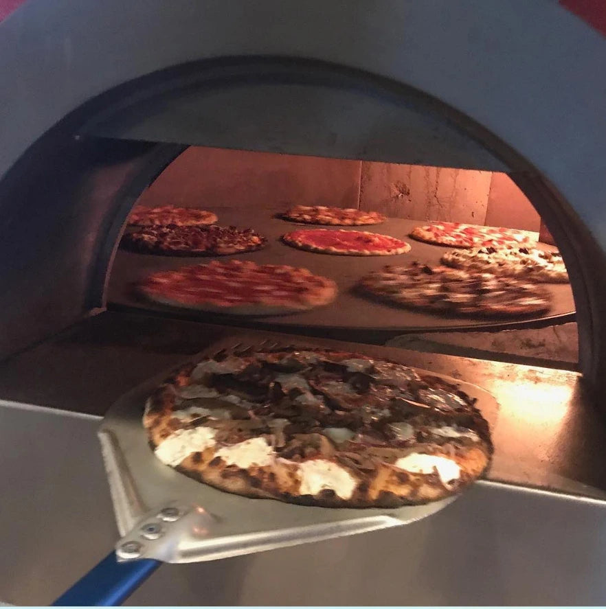 Pizzas baked in a Pavesi Forni PVP 130 TW Round oven