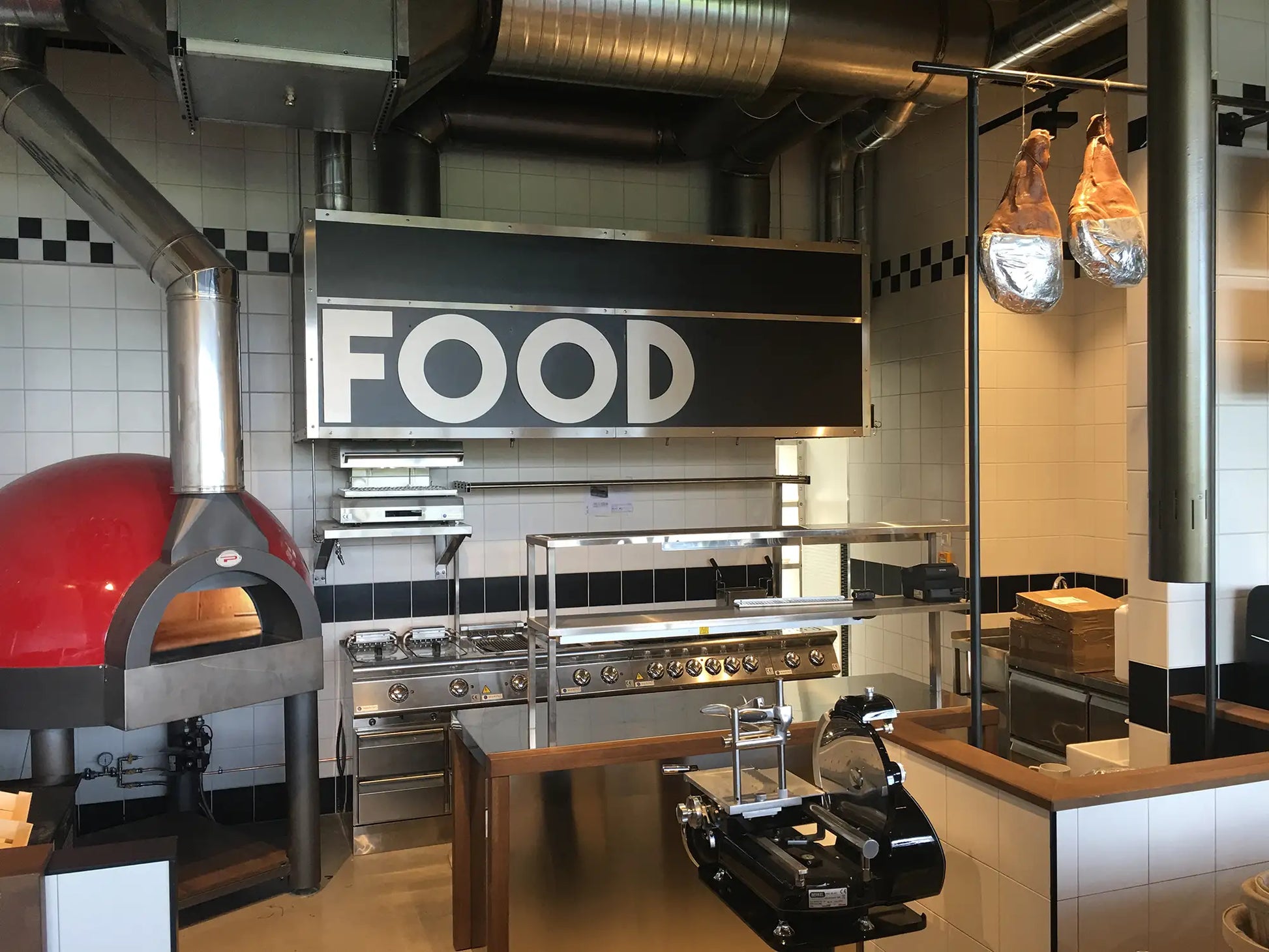 Pavesi Forni JOY 120 wood-fired pizza oven installed in a restaurant