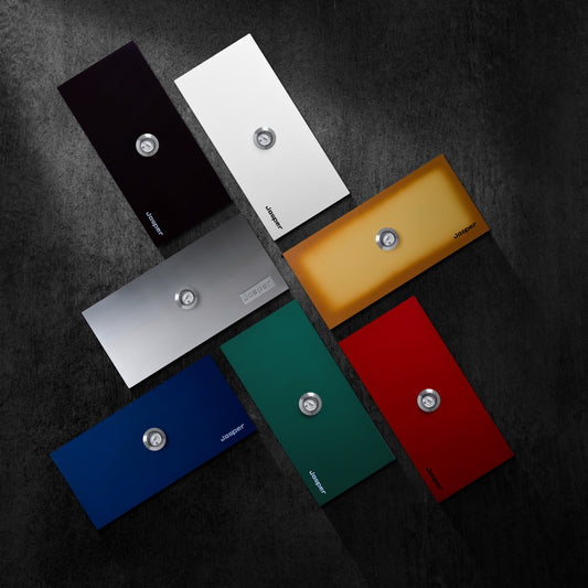 The seven Josper door finishes: black, white, copper, stainless steel, blue, green and red